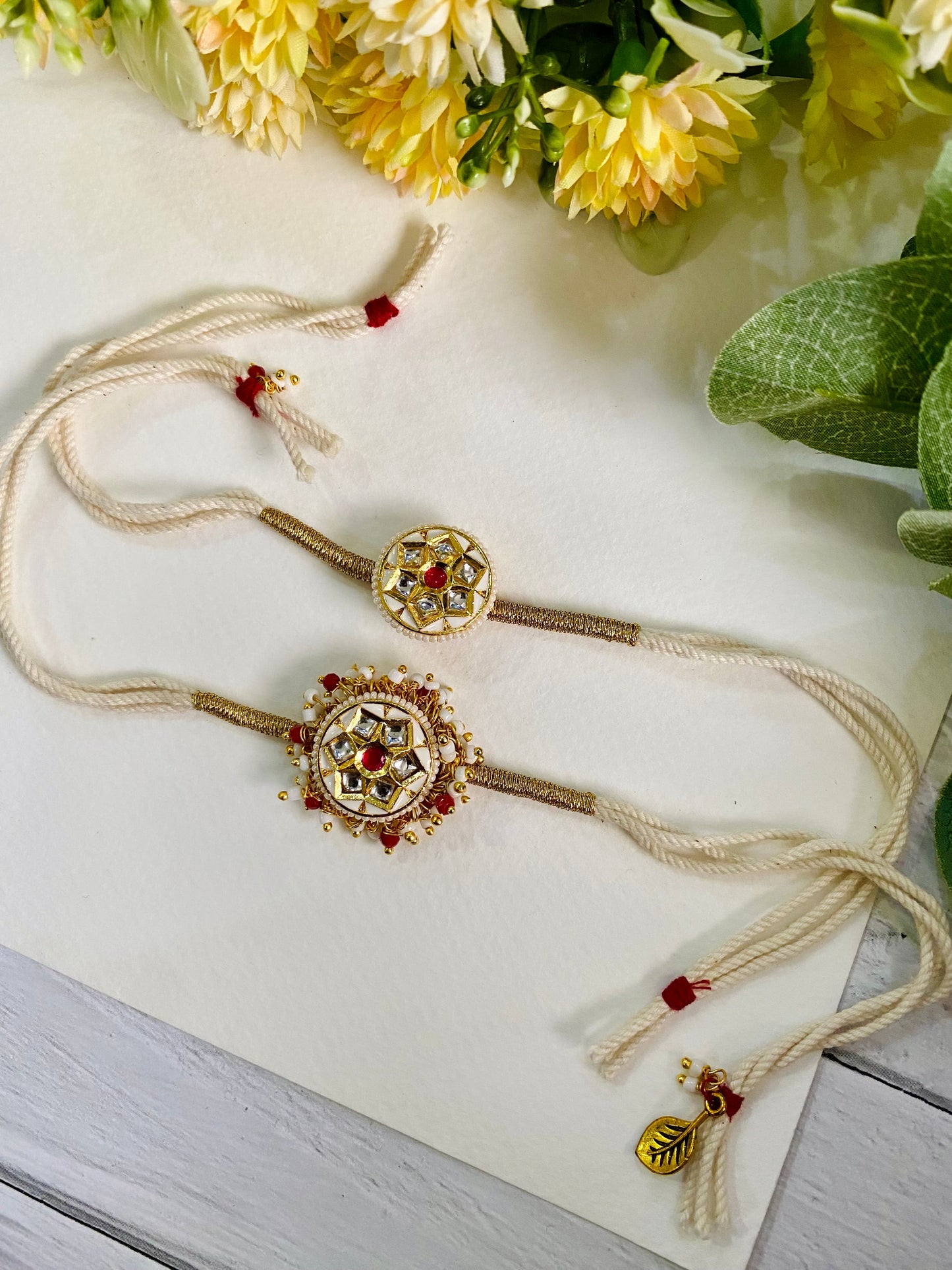 Six petal round Meena Kundan Bhai Bhabhi Rakhi set