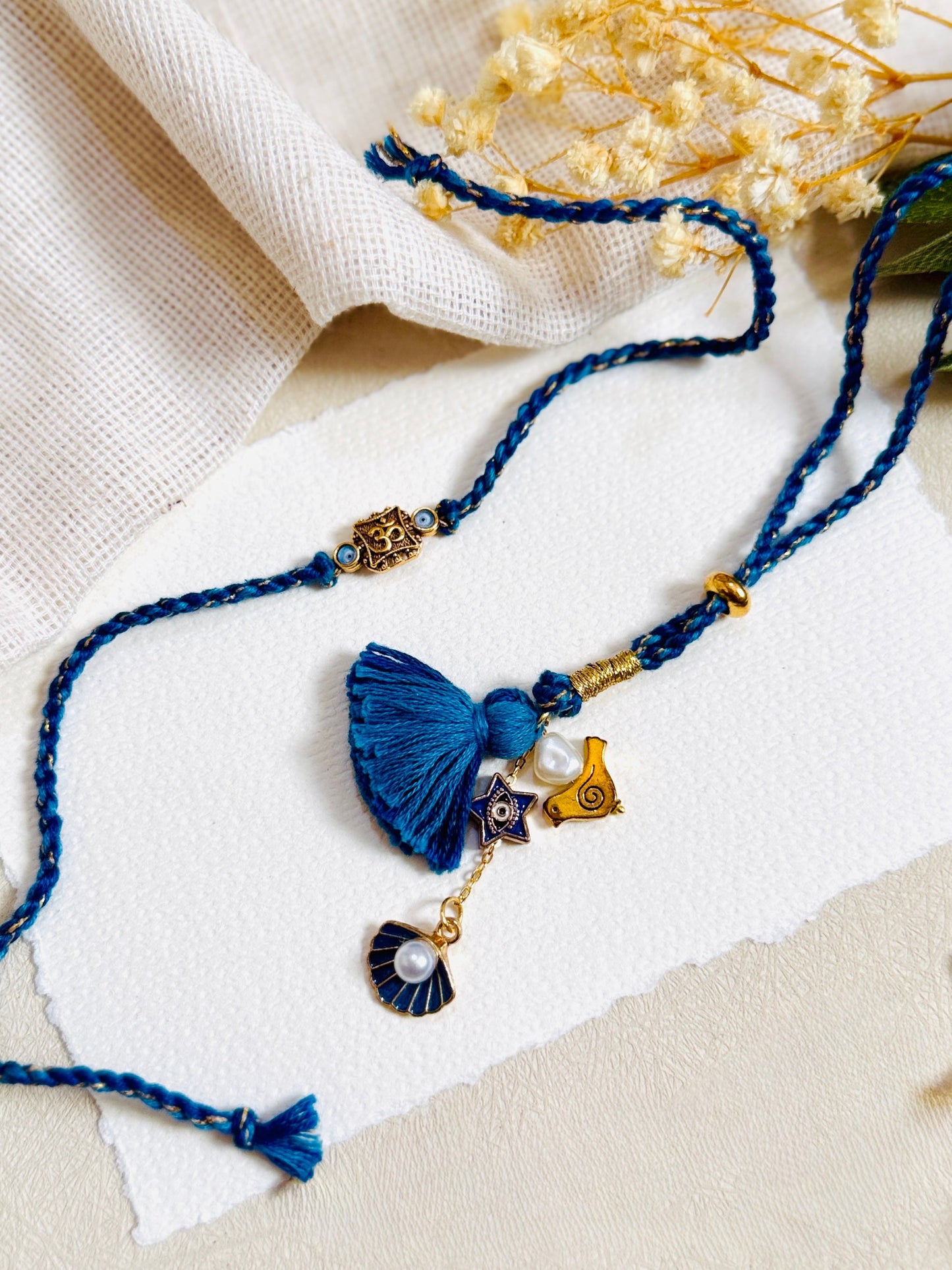 Om Evil Eye Bhai Bhabhi Rakhi Set
